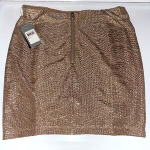 Guess women’s gold stretch mini skirt